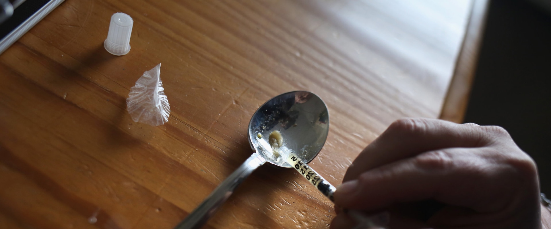 Who report on drug addiction?